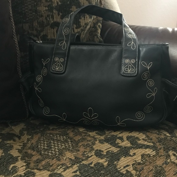 from Firenze Handbags - LIKE NEW Western style leather hand bag.